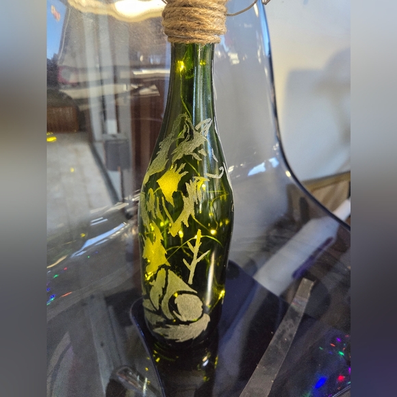 Hand Etched Hanging Lighted Wine Bottle Featuring Several Wolfs. - Picture 3 of 3